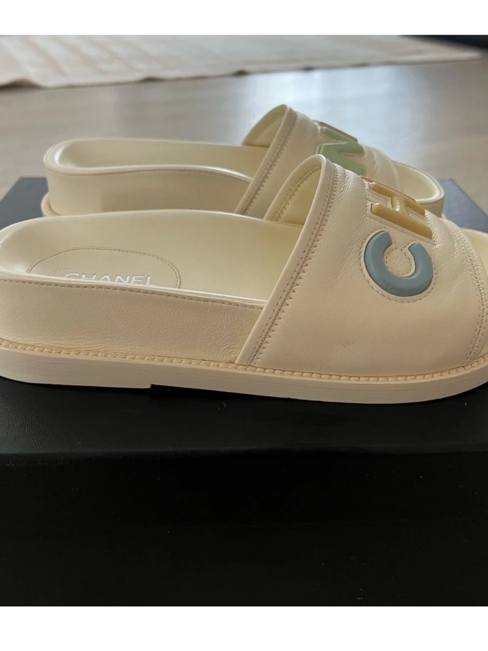 CHANEL Cream Leather Slide Sandals with Pastel Multicolor Logo